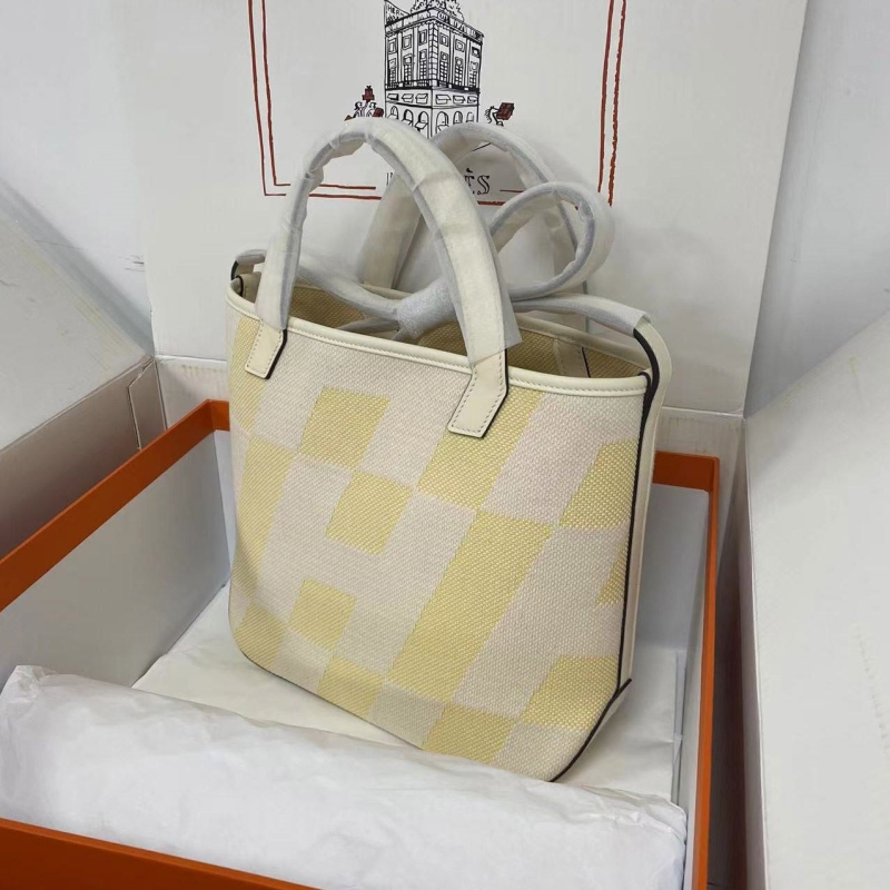 H**mes shopping bags